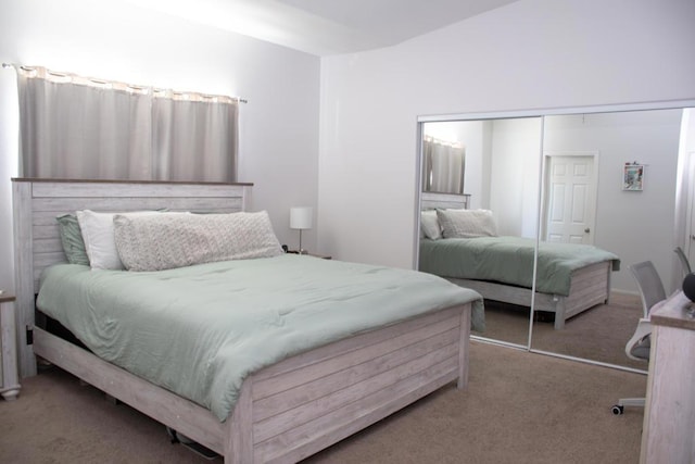 bedroom with carpet flooring and a closet