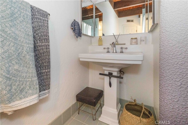 bathroom featuring tile patterned floors