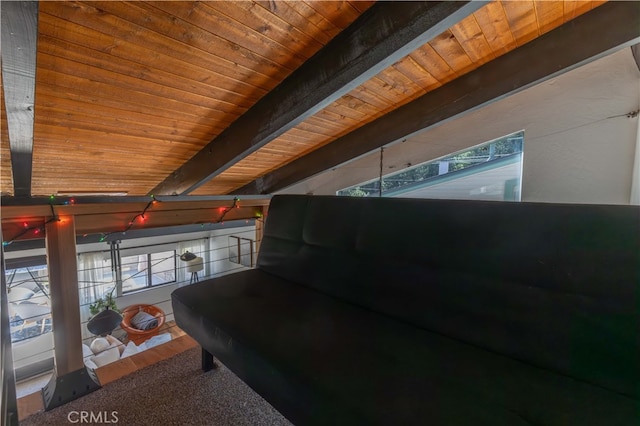 interior space featuring beam ceiling and wood ceiling