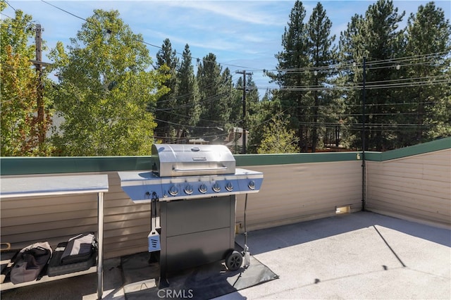 view of patio with a grill