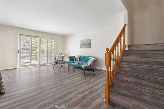 living room with dark hardwood / wood-style floors