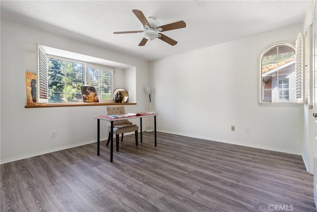 office with ceiling fan, a healthy amount of sunlight, and dark hardwood / wood-style floors