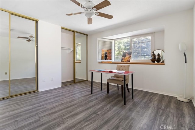 office space with dark hardwood / wood-style floors and ceiling fan