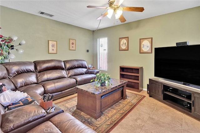 living room featuring ceiling fan