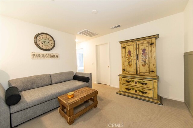 living room with light colored carpet