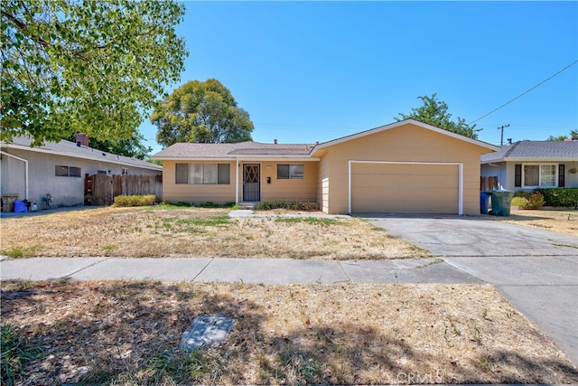 single story home featuring a garage