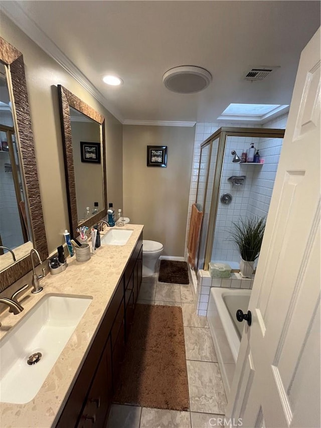 full bathroom with vanity, shower with separate bathtub, toilet, and crown molding