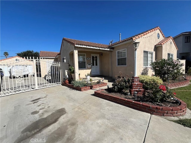 back of property with a garage