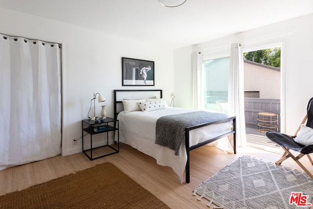 bedroom featuring light hardwood / wood-style floors