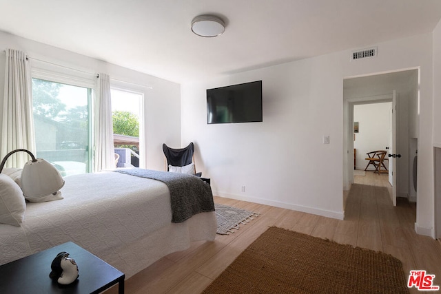 bedroom featuring light hardwood / wood-style floors