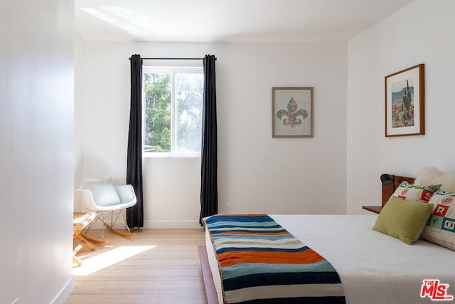 bedroom featuring light hardwood / wood-style flooring