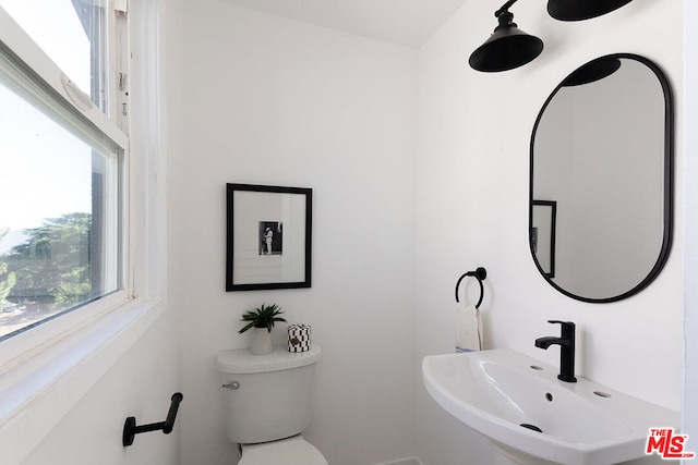 bathroom with sink and toilet