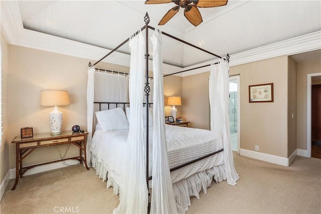 carpeted bedroom with ceiling fan and ornamental molding