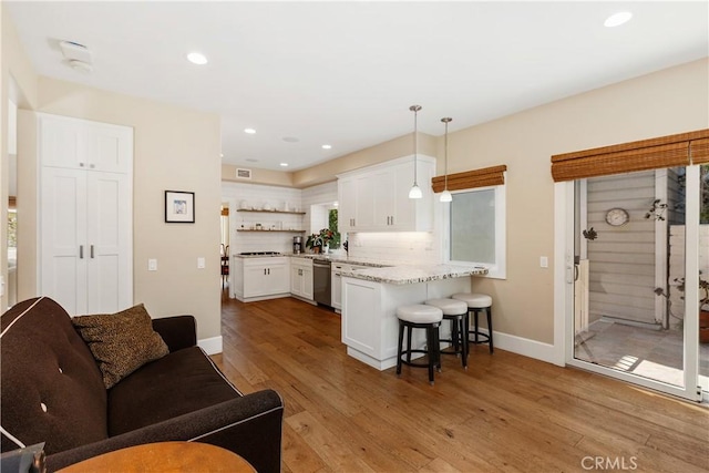 living room featuring light hardwood / wood-style floors