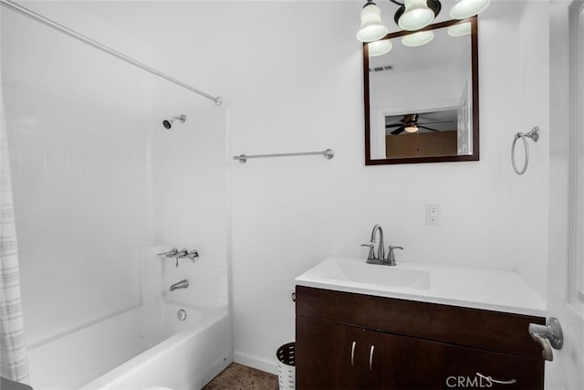 bathroom with shower / tub combo, ceiling fan, and vanity