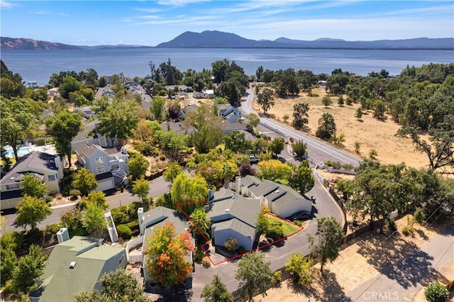 bird's eye view featuring a water and mountain view