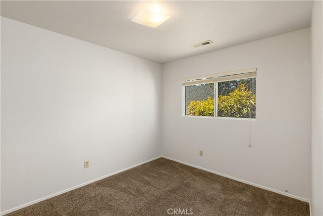 empty room with carpet floors