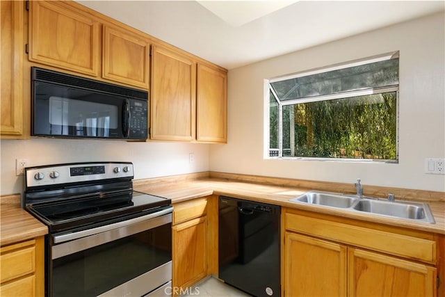 kitchen featuring sink and black appliances