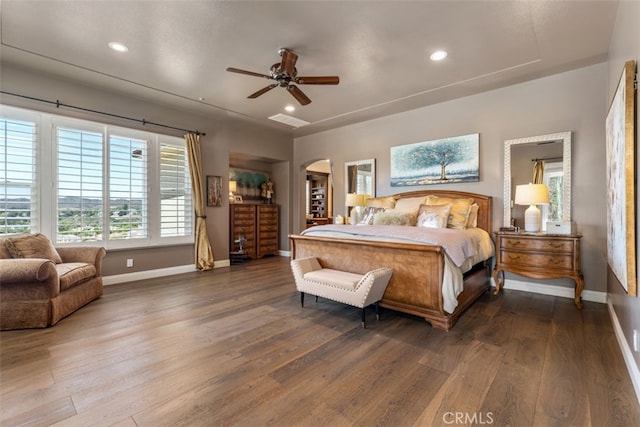 bedroom featuring wood-type flooring and ceiling fan