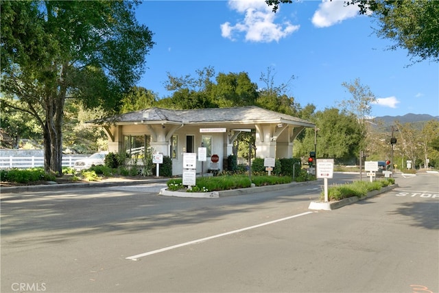 view of front of property with a mountain view