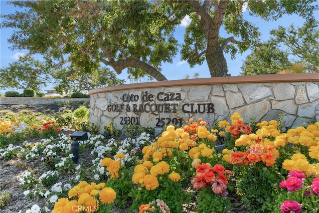 view of community sign