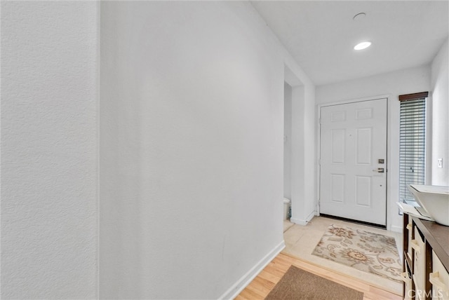 entrance foyer with light hardwood / wood-style flooring