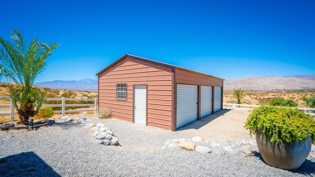 garage featuring a mountain view