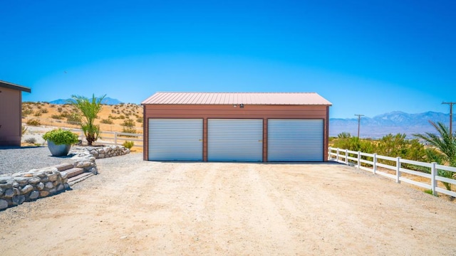 garage featuring a mountain view