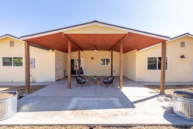 back of property featuring a patio area