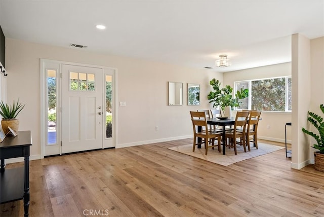 foyer with light wood-type flooring