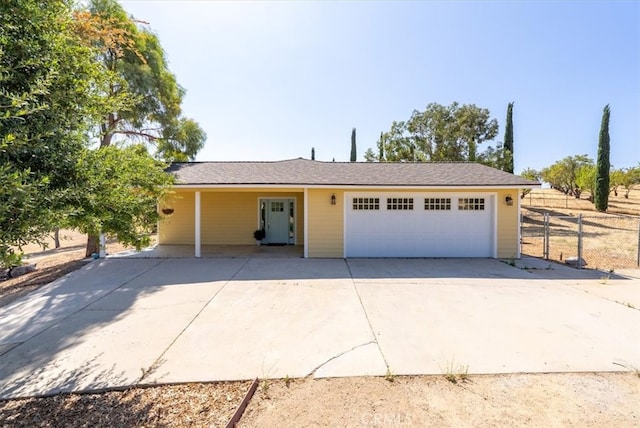 single story home featuring a garage