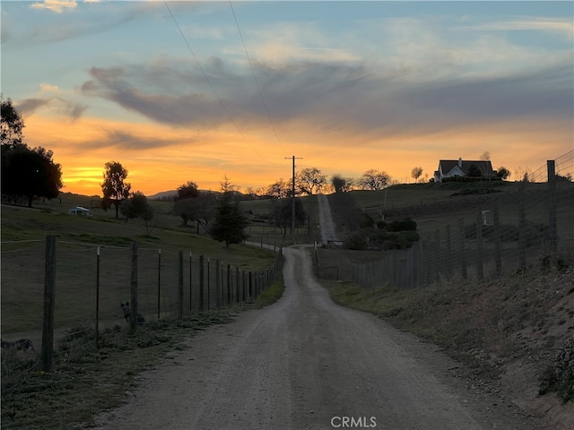 view of street featuring a rural view