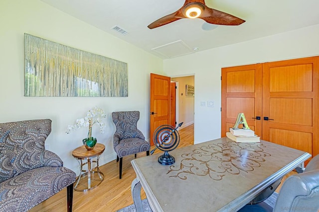 interior space with light hardwood / wood-style flooring and ceiling fan