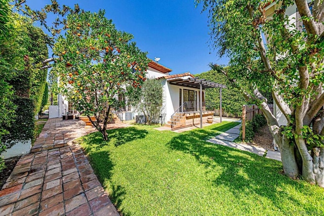 view of yard with a pergola