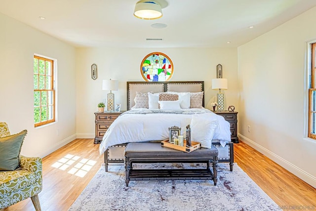 bedroom with wood-type flooring