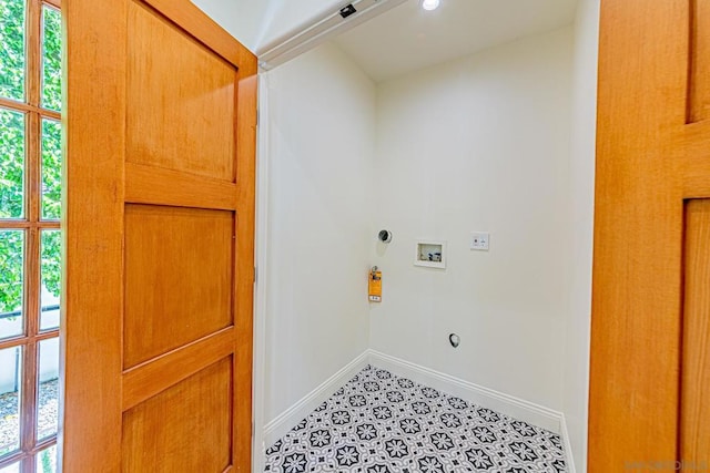 laundry area featuring washer hookup, plenty of natural light, hookup for an electric dryer, and hookup for a gas dryer