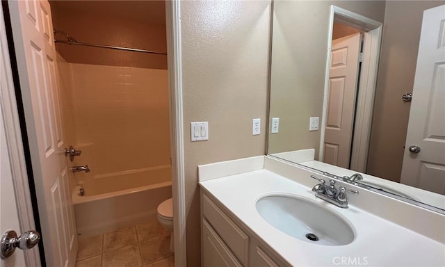 full bathroom featuring tub / shower combination, vanity, toilet, and tile patterned floors