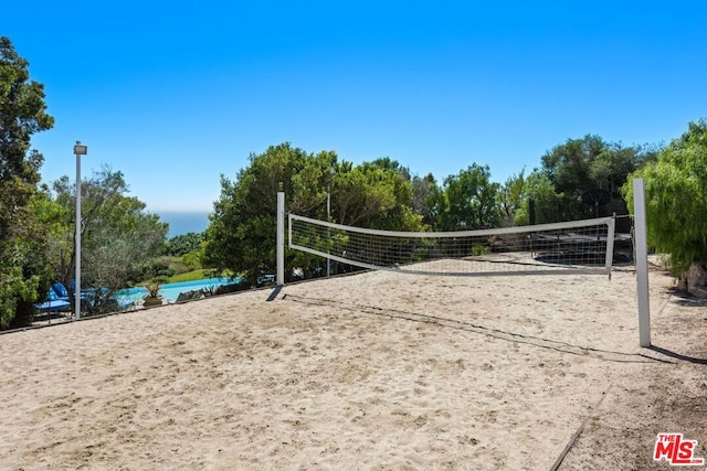 view of home's community with volleyball court