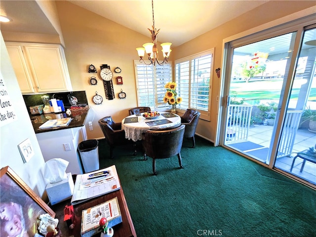 carpeted dining area with a notable chandelier