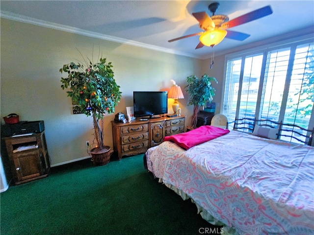 carpeted bedroom featuring crown molding and ceiling fan