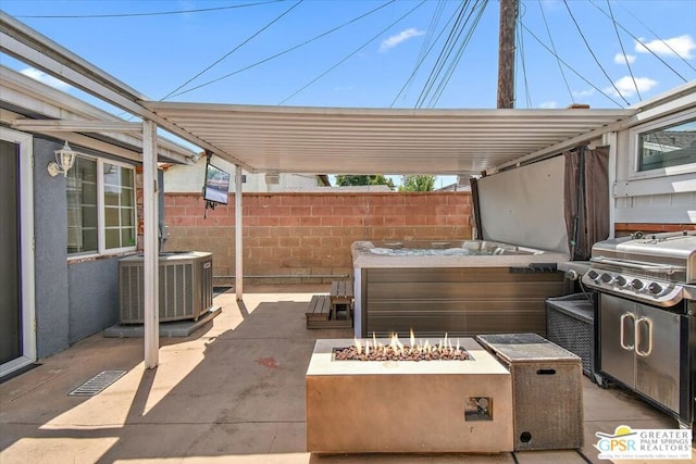 view of patio / terrace featuring central AC unit and a grill