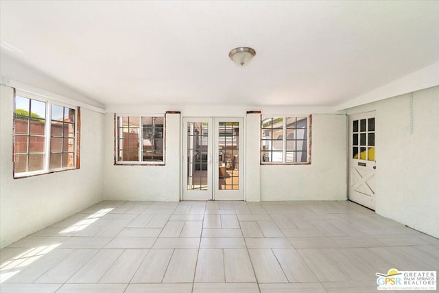 interior space with light tile patterned floors