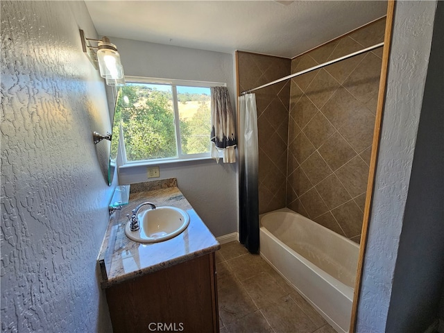 bathroom featuring vanity and shower / tub combo with curtain