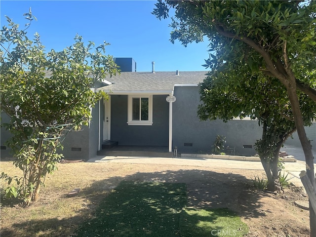 rear view of property with a patio area