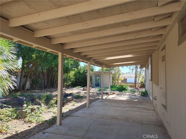 view of patio / terrace with a storage unit