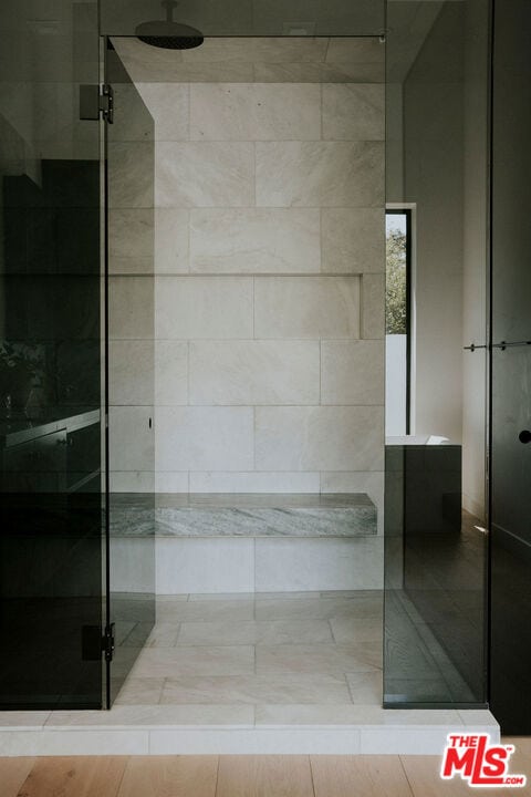 bathroom with an enclosed shower