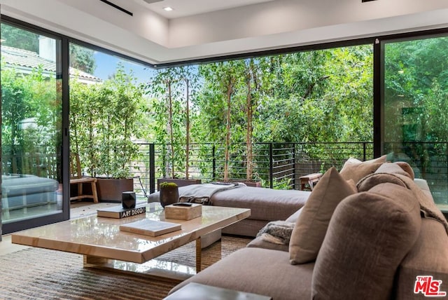 sunroom / solarium with a healthy amount of sunlight