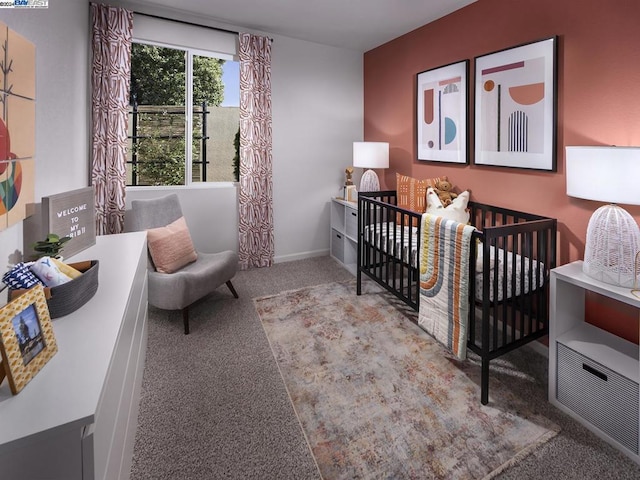 bedroom with carpet flooring and a nursery area