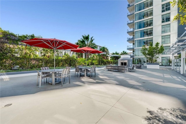 surrounding community featuring a patio area