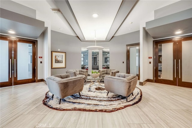 living room featuring french doors